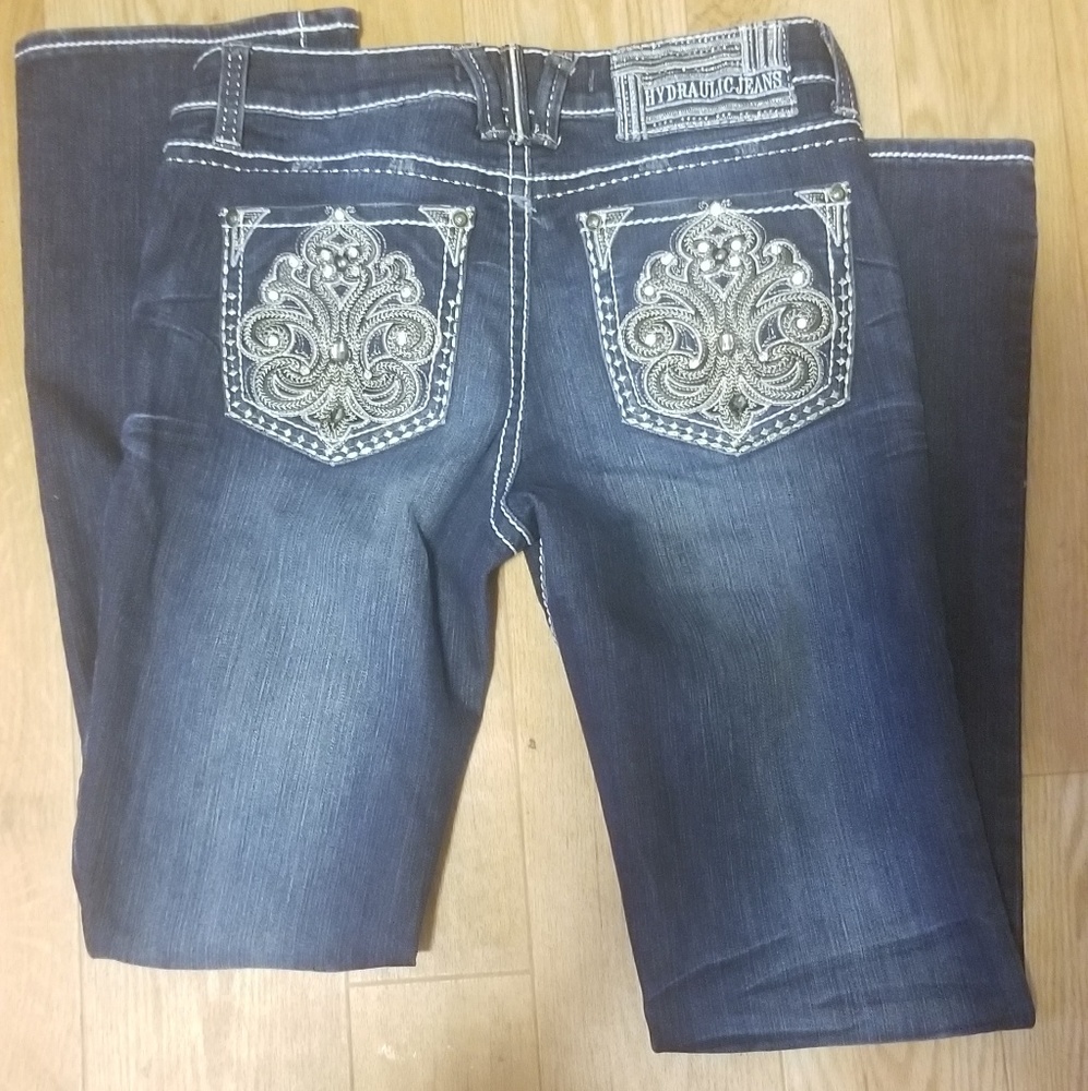Boot cut Jean's with design on pockets